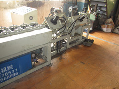 自动化包装新篇章 钢带包边机与免熏蒸包装箱生产线的革新应用